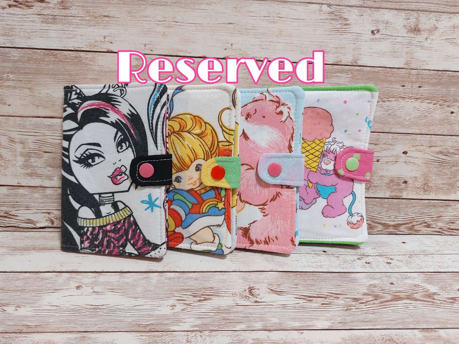 Reserved 4 upcycled wallets and 5 care bear upcycled en