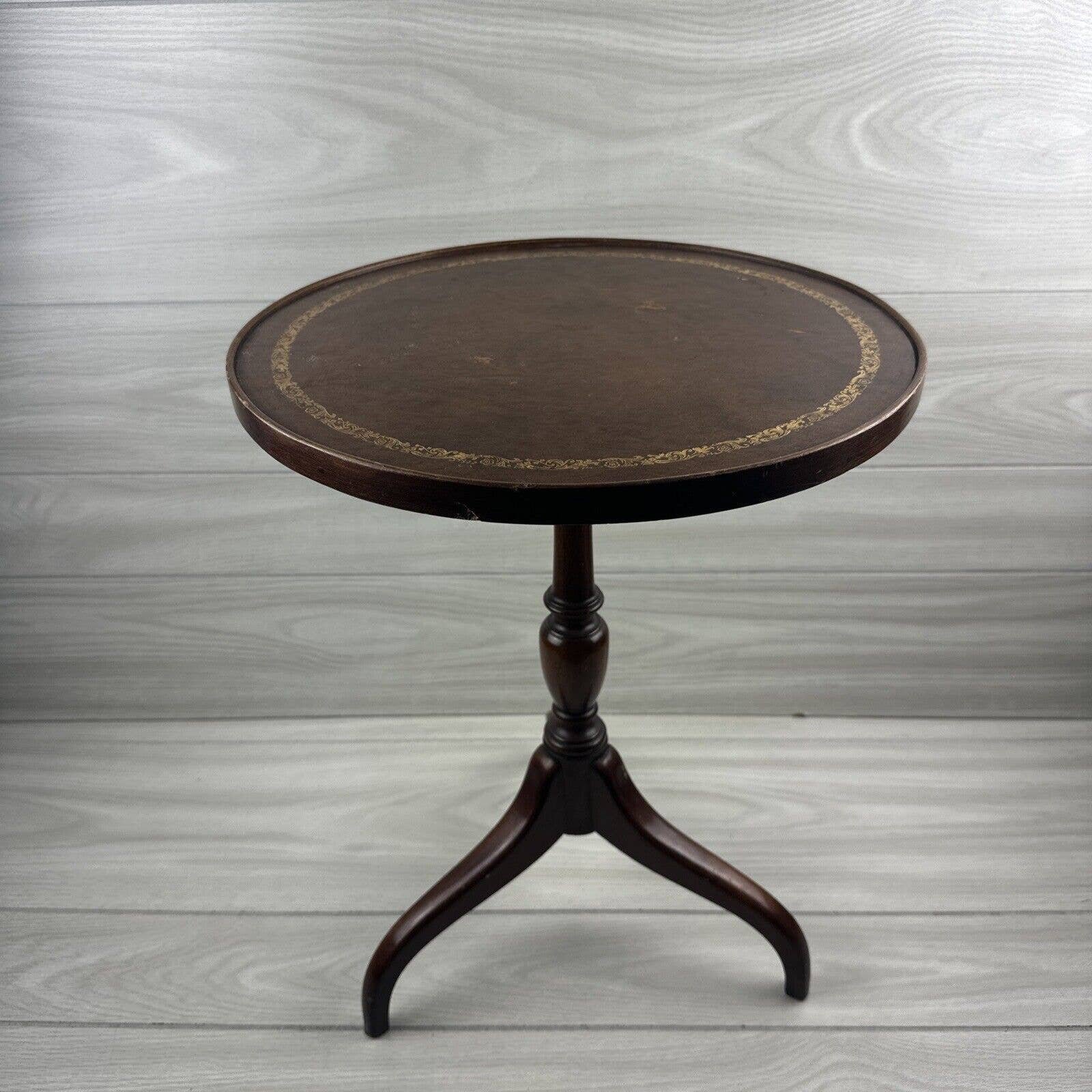 Vintage Georgian emboss leather top round mid century table. 19