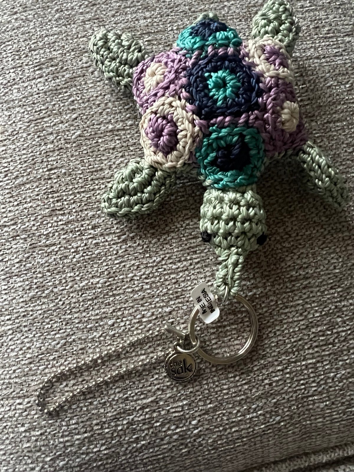 The Sak Darling Crochet Multicolor Turtle Purse Tie On,