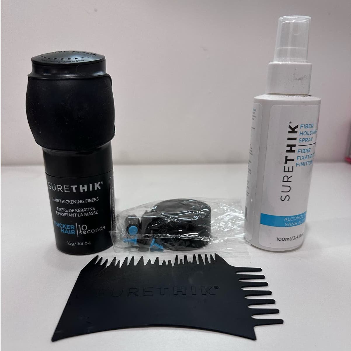 Surethik fibers hair loss starter kit, used only once.  Sells for $49 on sale 3EB7kWYuS